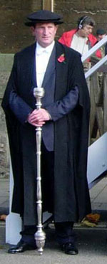 Bedel with stave