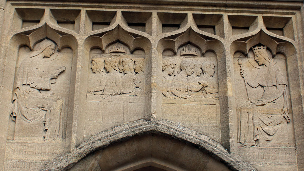 Carvings over the school's door