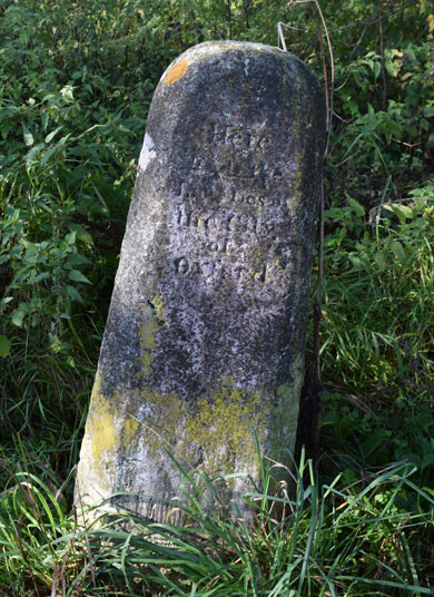 Boundary stone on towpath
